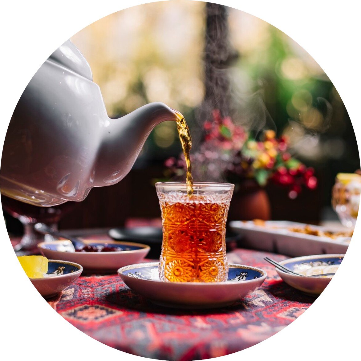 person-pouring-tea person-pouring-tea